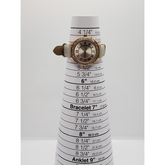 Women\'s large Silver face watch Gold jeweled bevel edge. PT6001